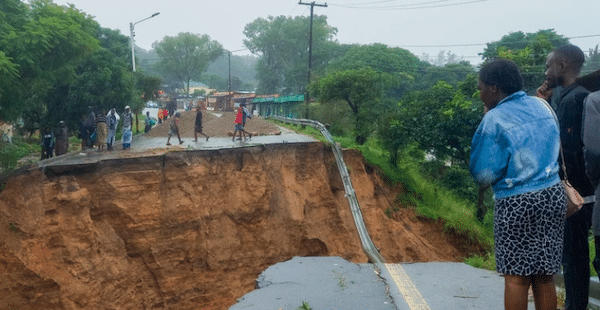 | People look at a damaged road in Blantyre Malawi on March 14 2023 Photo Joseph MizereXinhua via Getty Images | MR Online